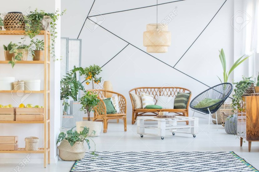 white botanic living room with rattan furniture set