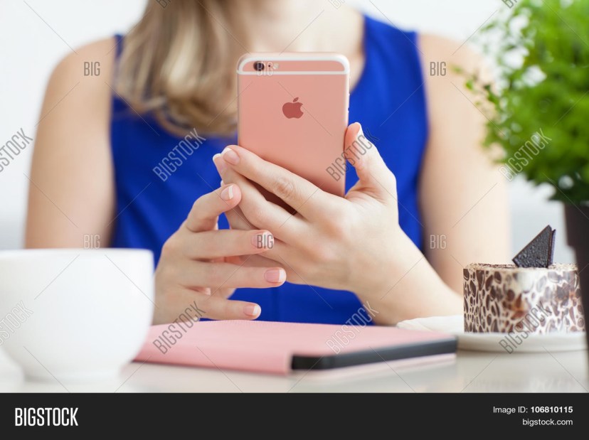 woman holding iphone image photo free trial bigstock