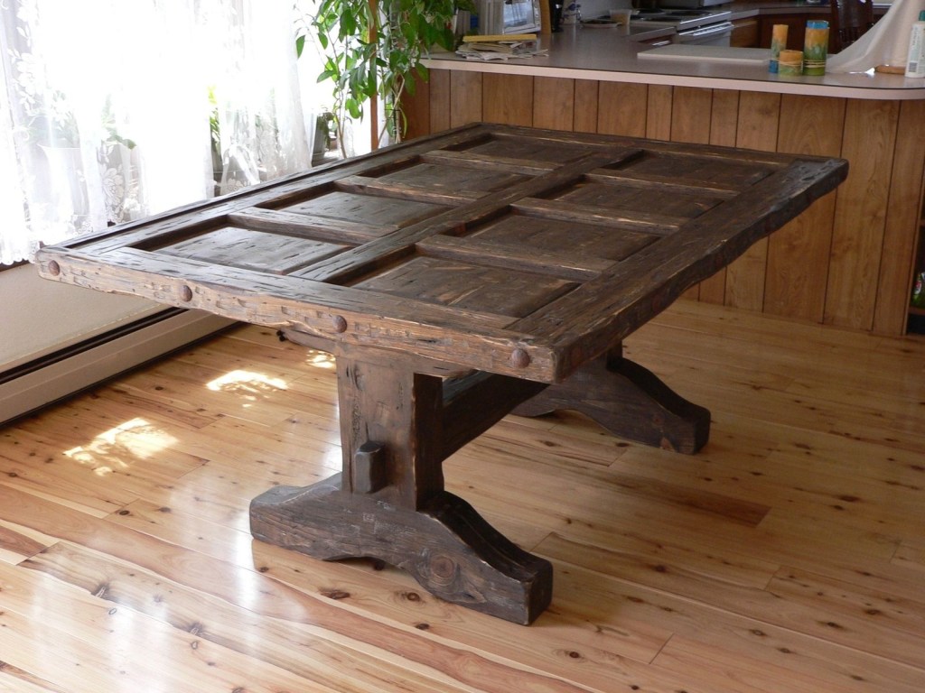 custom southwest distressed dining room table with glass