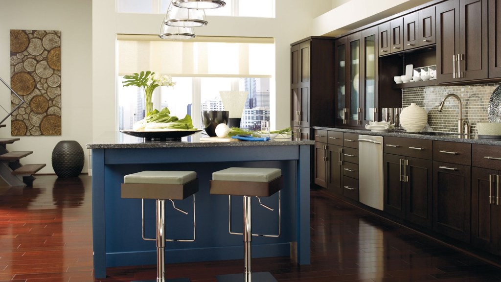 dark wood cabinets with a blue kitchen island omega