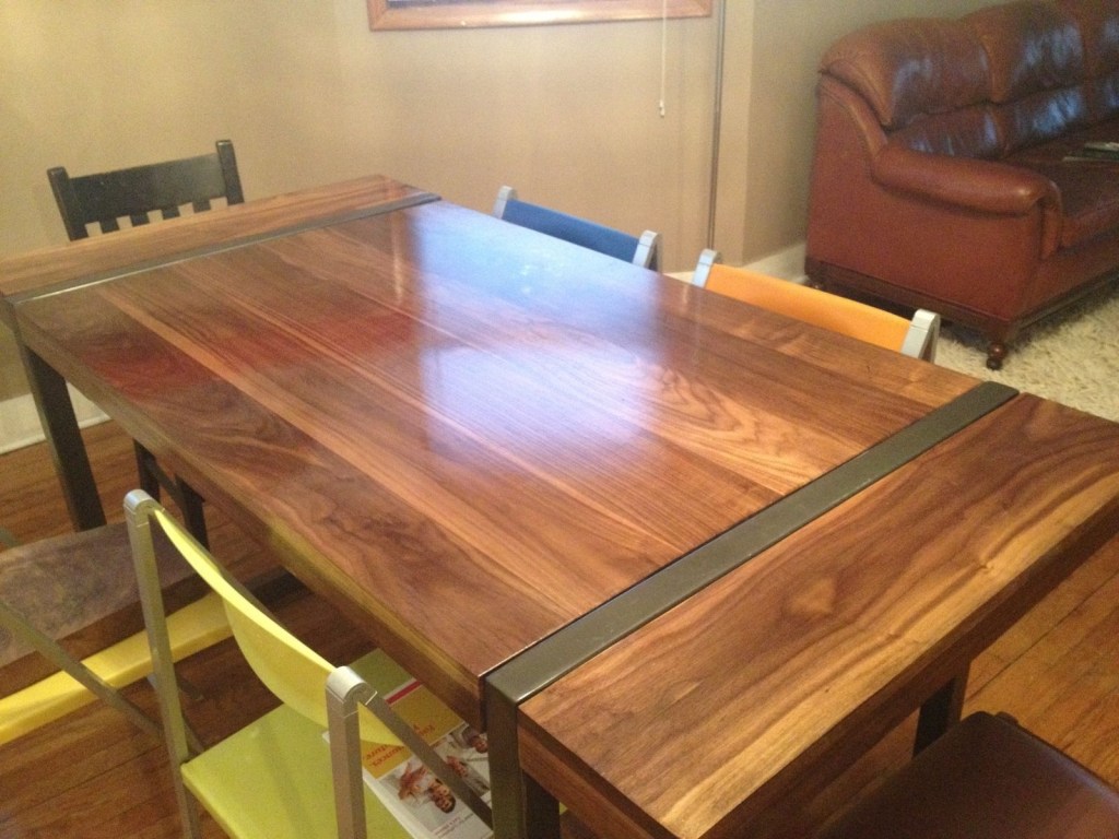 hand made black walnut dining table with welded steel base
